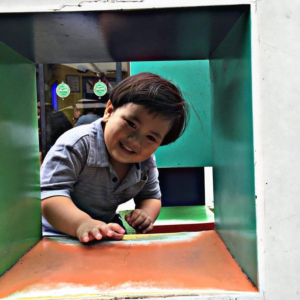 Toddler playing in the playground