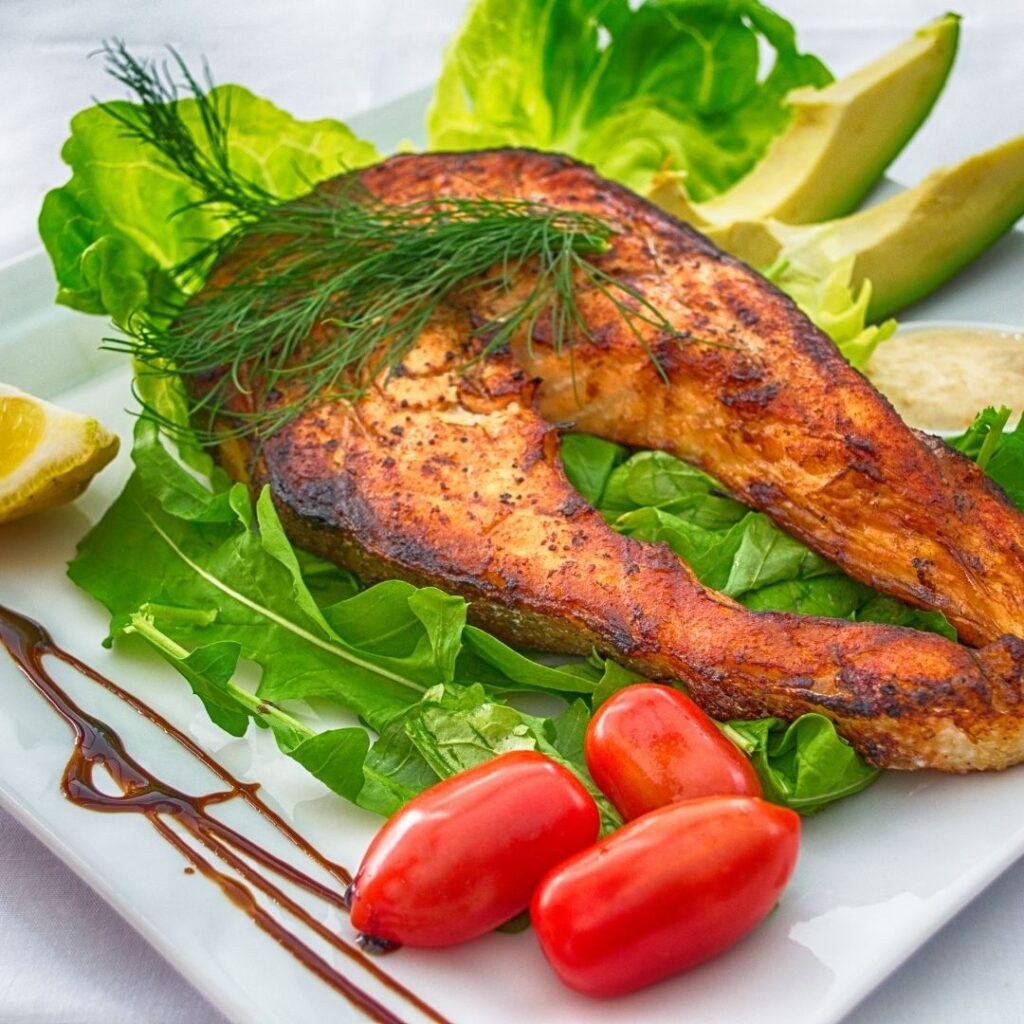 Cooked Fish with lettuce and tomato